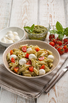 cold pasta salad with mozzarella and pesto sauce