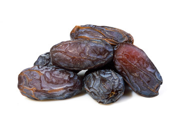 big ripe dates heap isolated on white background