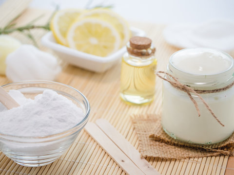 skin care natural products ingredients for acne treatment:  lemon juice, white yogurt, backing soda almonds oil 1