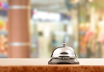 Vintage hotel reception service desk bell.