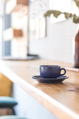 cup of coffee on table in cafe