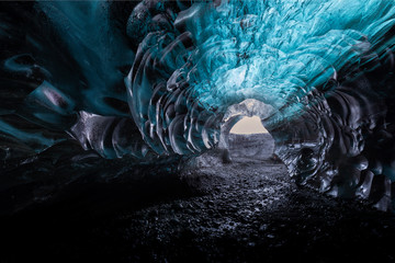 Blue ice cave in Vatnajokull glacier, Iceland - Powered by Adobe