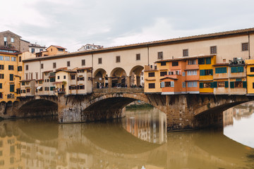 Fototapeta na wymiar Medieval bridge Ponte Vecchio over the Arno River in Florence