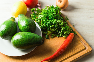 Organic vegetable, mexican food, cooking traditional snack guacamole.