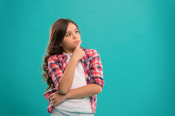 Daydreaming concept. Kid thoughtful face make decision. Child cute curly hair thinking. Hard...