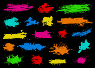 Colored ink splash spots big set isolated on black background. Art brushes pack. Vector illustration