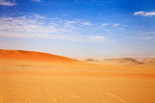 The desert in Paracas in Peru. Yta sea and sand