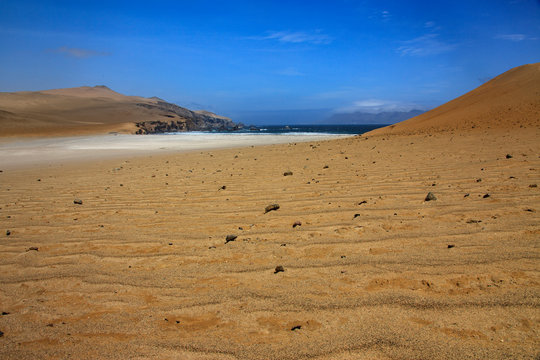 The desert in Paracas in Peru. Yta sea and sand