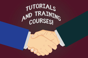 Writing note showing Tutorials And Training Courses. Business photo showcasing Learning Coaching Education School attendance Hu analysis Shaking Hands on Agreement Sign of Respect and Honor