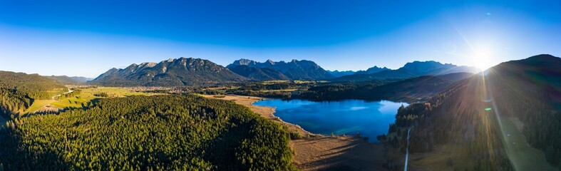 Naklejka premium Aerial view, Barmsee, Grubsee, behind the alps, Bavaria, Germany,