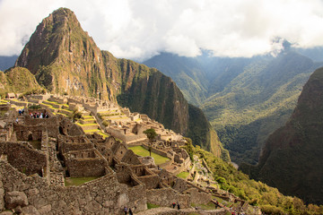 Fototapeta na wymiar Machu Picchu in Peru, inca fortress that rises in the Peruvian Andes