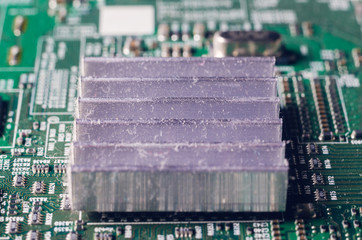 A thick layer of dust covers the internal electronic components of the computer