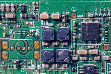 A thick layer of dust covers the internal electronic components of the computer