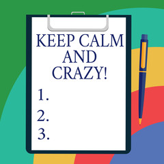 Conceptual hand writing showing Keep Calm And Crazy. Business photo showcasing Relax and go insane happy get excited celebrate Sheet of Bond Paper on Clipboard with Ballpoint Text Space