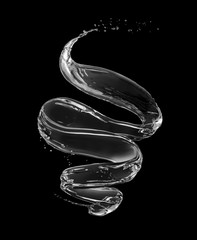 Splashes of water in a swirling shape on black background