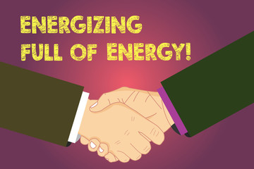 Word writing text Energizing Full Of Energy. Business concept for Focused energized full of power motivated Hu analysis Shaking Hands on Agreement Greeting Gesture Sign of Respect photo
