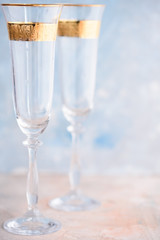 Two glass champagne glasses.Two beautiful glass champagne glasses on New Year's Eve.