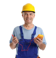 Electrician with multimeter wearing uniform on white background