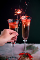 Two glass champagne glasses.Two beautiful glass champagne glasses on New Year's Eve.painted in the fashionable color of 2019