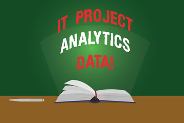Text sign showing It Project Analytics Data. Conceptual photo Information technologies modern applications Color Pages of Open Book photo on Table with Pen and Light Beam Glaring