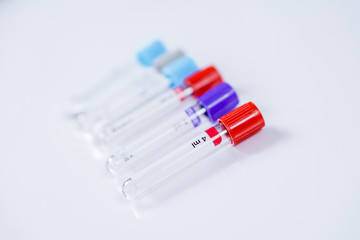Six bottles for samples used in hospitals or medicine for blood samples in a laboratory on white background
