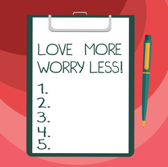 Text sign showing Love More Worry Less. Conceptual photo Have a good attitude motivation be lovable enjoy life Blank Sheet of Bond Paper on Clipboard with Click Ballpoint Pen Text Space
