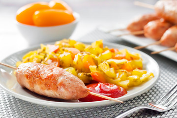 Stewed vegetables with turmeric and cumin and turkey kebab