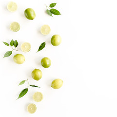 Pattern made of lime and leaves ficus. Food concept.  flat lay, top view