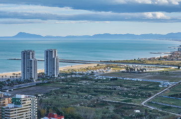 Aerial view of Cullera beach with village skyline in the Mediterranean Valencia of Spain
