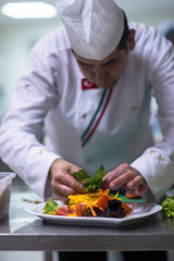 chef serving vegetable salad