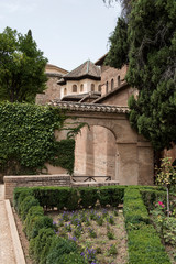 Fototapeta na wymiar Architecture of the famous Alhambra Palace in Granada, Andulasia, Spain. The palace is a famous Islamic historical palace with spectacular architectural beauty.
