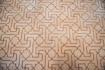 Obraz premium Closeup of a beautiful medieval time architecture seen inside Alhambra Palace. The architecture seems apalling and stunning with details. The design is similarly fascinating.