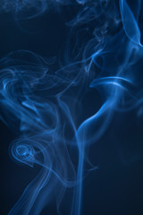 Abstract blue smoke swirls