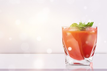 Glass of alcohol cocktail on white background, bloody Mary.