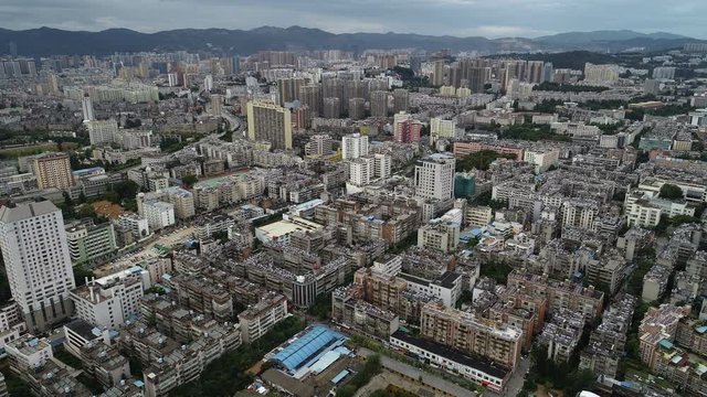 Drone shot of residential apartment buildings and suburbs of Kunming in China