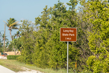 Long Key, USA Sign for Florida keys state park at overseas highway road, street, traffic signs