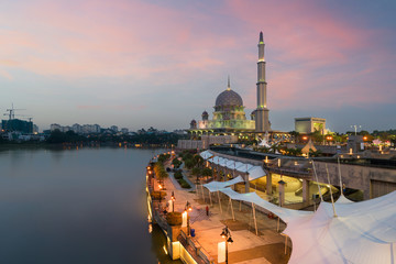 Putrajaya mosque between sunset in Kuala Lumpur, Malaysia. Pink mosque in Kuala Lumpur, Malaysia. Asia.
