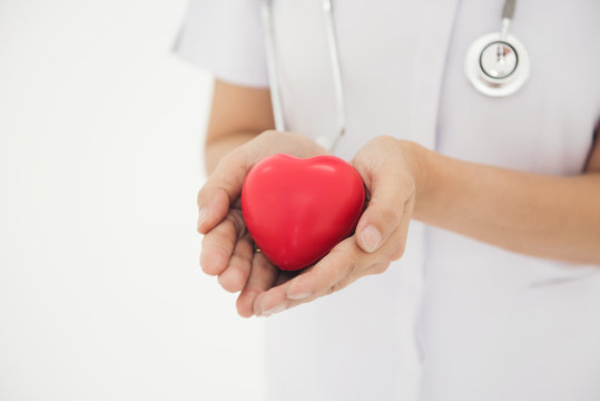 Nurses use hands to show heart shape concept