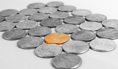 Pennies/Coins with One Standing Out