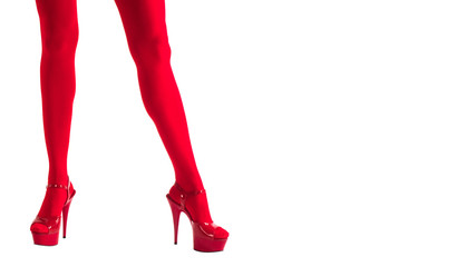 Sexy female legs in fetish red stockings and red high heels, isolated on white, entertainment, show business
