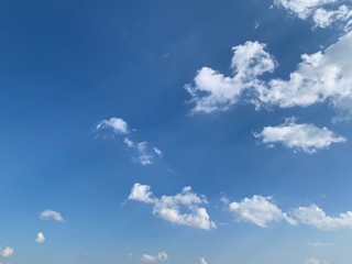 The white clouds in the sky