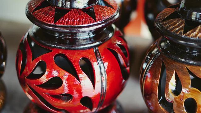 Handmade traditional craft known as 'labu sayong' normally used as gift or souvenir found in Perak,Malaysia. Clay pottery arts. Artistic clay container carving. GRADED.Panning Shot