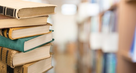 Old Books stacked on background.
