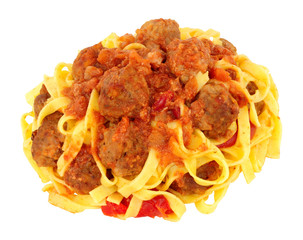 Pork meatballs and tagliatelle pasta meal isolated on a white background
