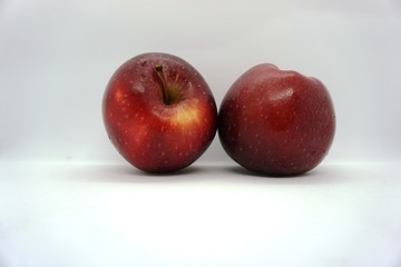 two red apples close up.