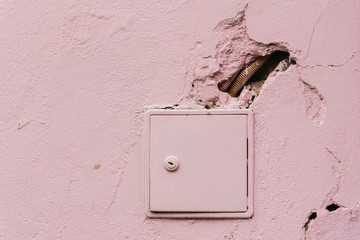 electric box on colorful pink wall