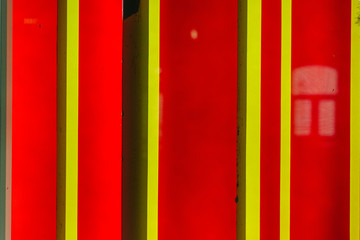abstract red background with yellow stripes