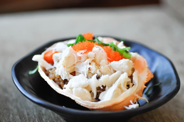 rice topped with crab, steamed crab