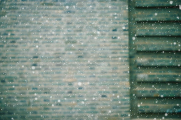 Traditional brick material splicing wall after snowing in winter