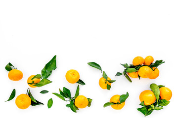 Winter fruits for New Year and Christmas. Tangerines on white background top view mock-up